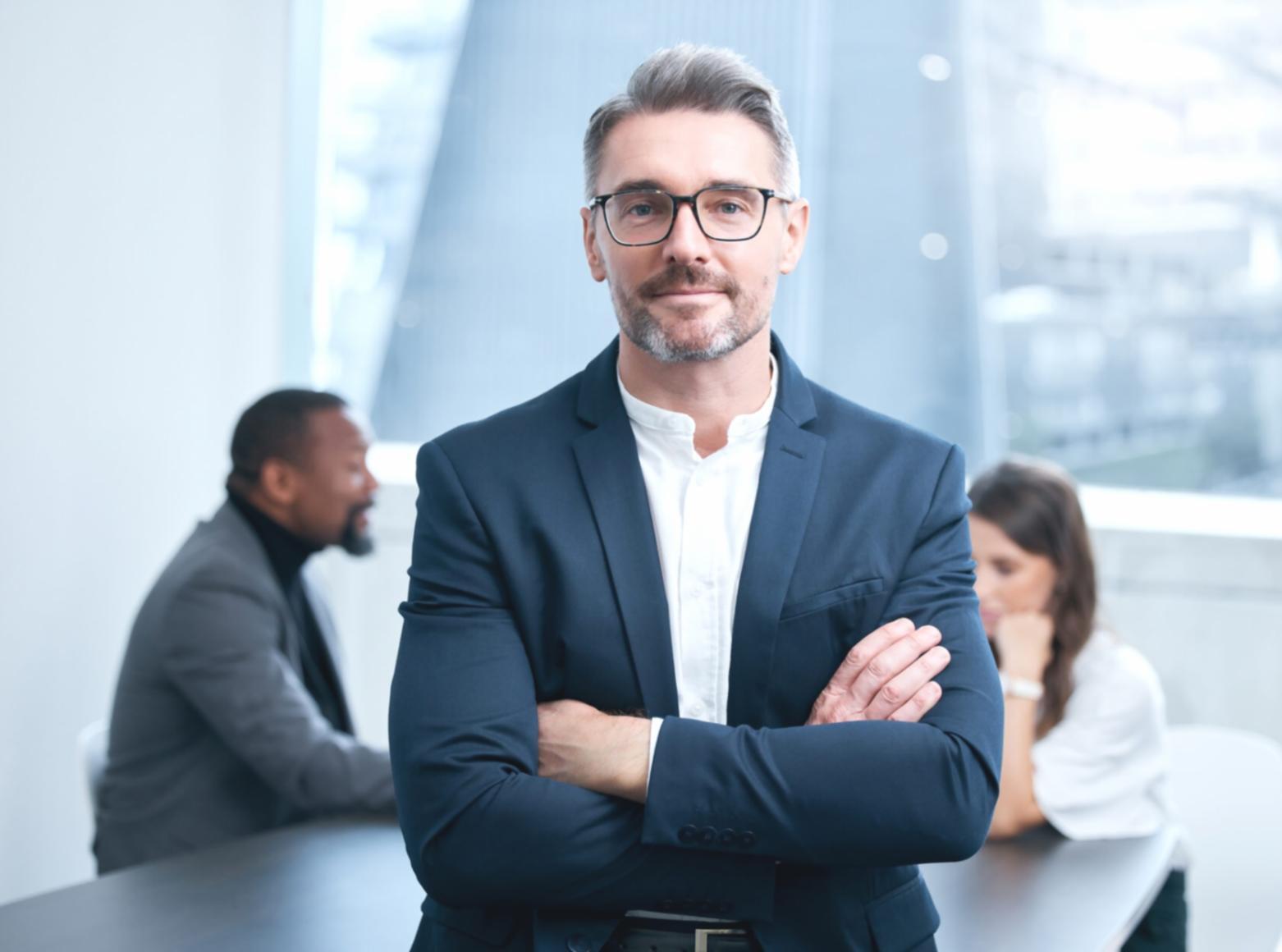 Instructor explaining camera settings with real equipment